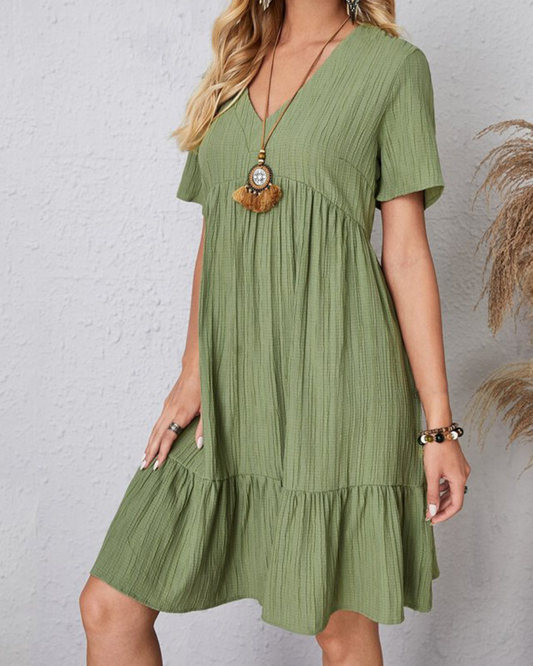 Romy - Peplum Jurk met V-hals